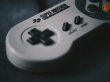 selective focus photography of SNES controller