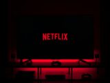 flat screen television displaying Netflix logo