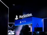 Playstation logo and ps5 branding at night
