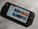 Handheld gaming console displaying a video streaming service.