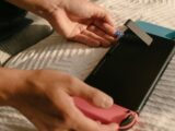 a person holding a device