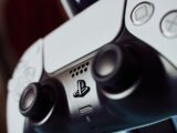 silver and black game controller
