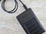 a close up of a cell phone on a table