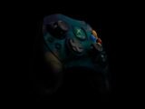 teal and black Xbox Original controller