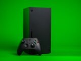black xbox one console with controller