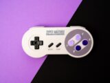 white and black game controller
