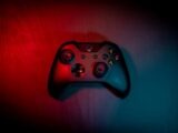 a close up of a controller on a wall