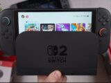 A nintendo switch is docked and on.