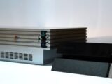 Sony PS2 beside PS4 consoles