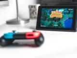 black tablet computer on white table