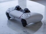 a close up of a game controller on a table