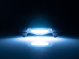 a close up of a car in the dark