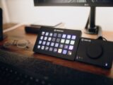 Stream Deck and audio interface on a modern workspace desk.