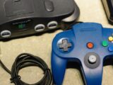 A couple of game controllers sitting on top of a table